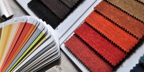 Close-up of fabric swatches and color palette, ideal for interior design and textile projects.