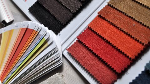 Close-up of fabric swatches and color palette, ideal for interior design and textile projects.