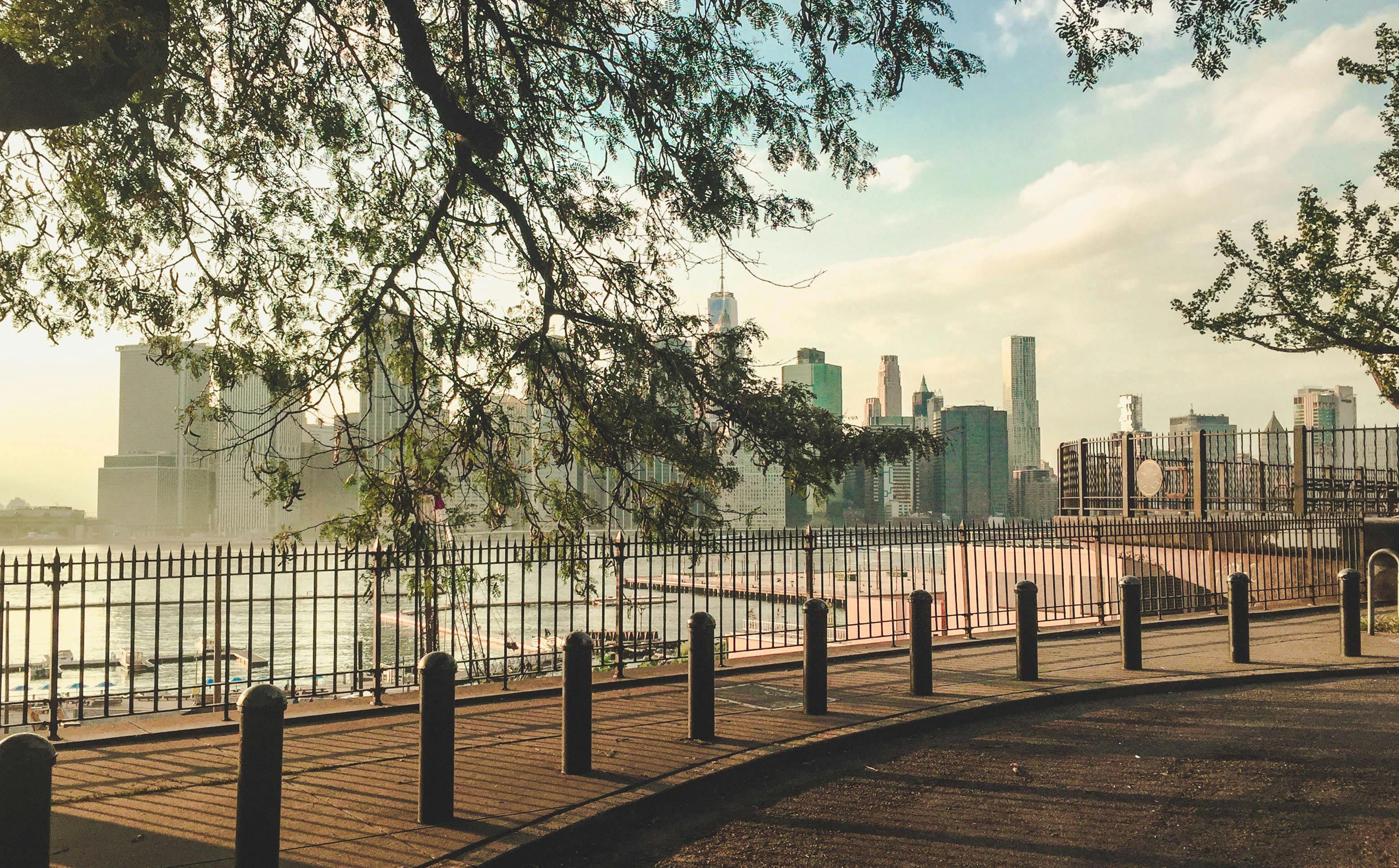 Quiet park bench in Brooklyn with view of Manhattan skyline - where can i smoke weed in brooklyn