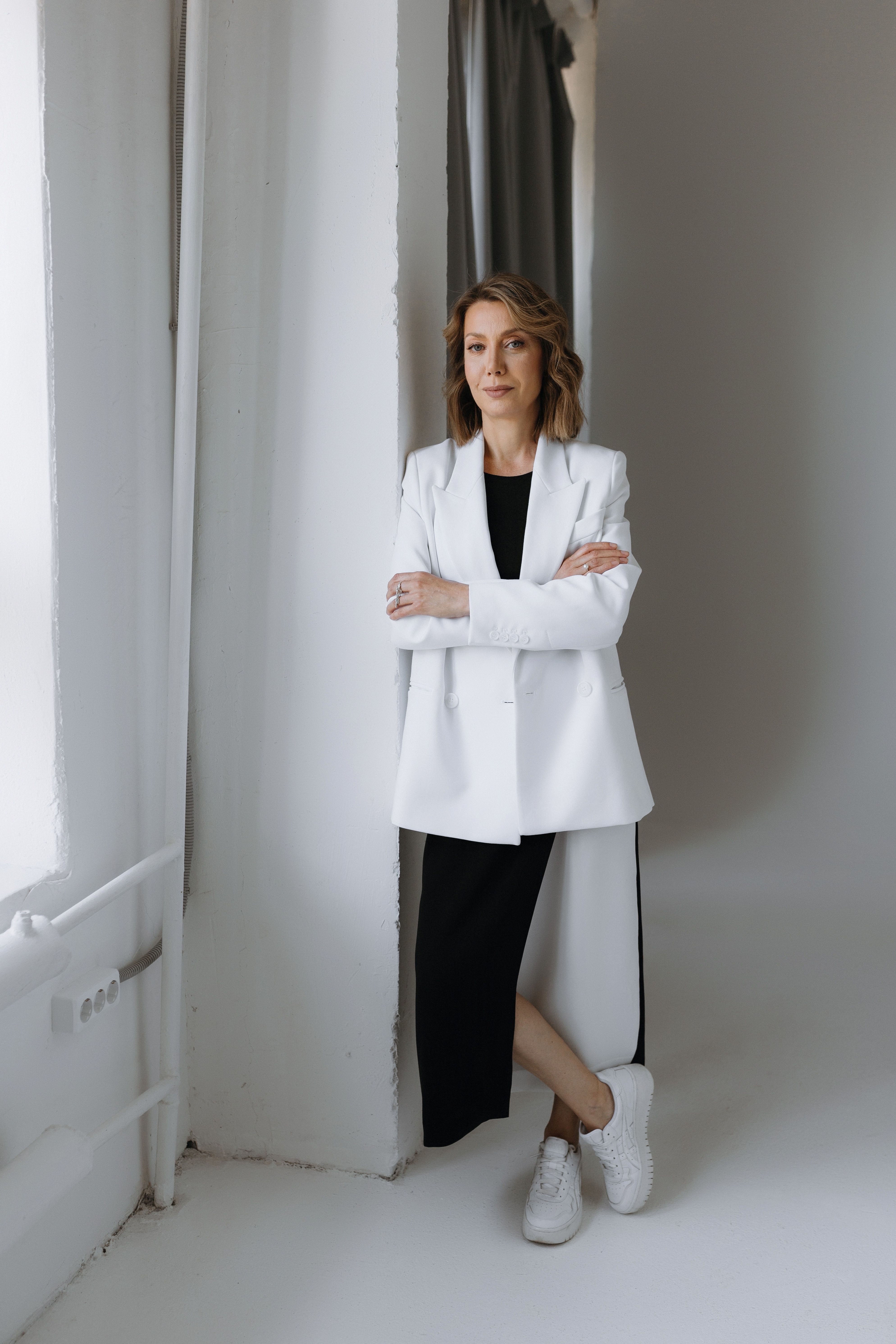 Woman Standing in White Suit Jacket · Free Stock Photo