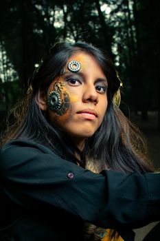 Woman in steampunk costume featuring intricate face gear art and vivid makeup.