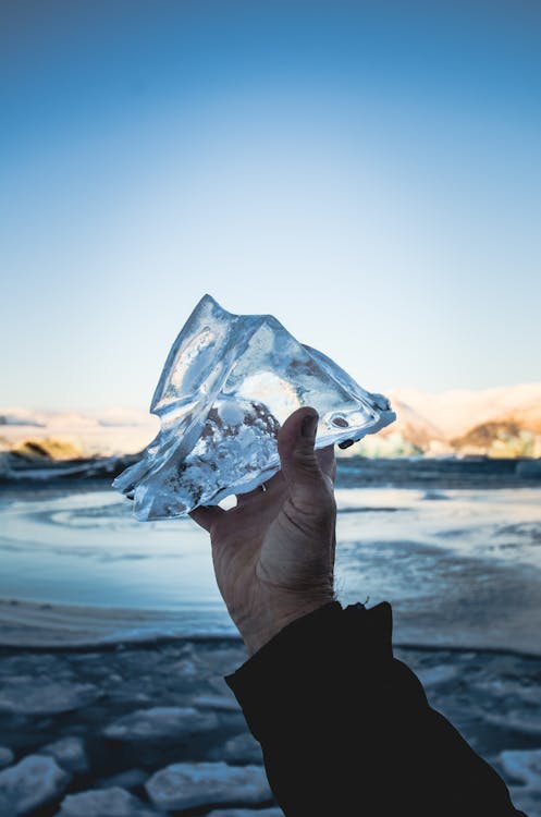 Free Photo of Person Holding Ice Stock Photo