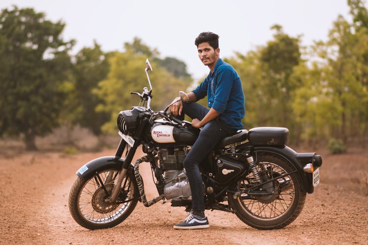 Photo Of Man Sitting On Motorcycle