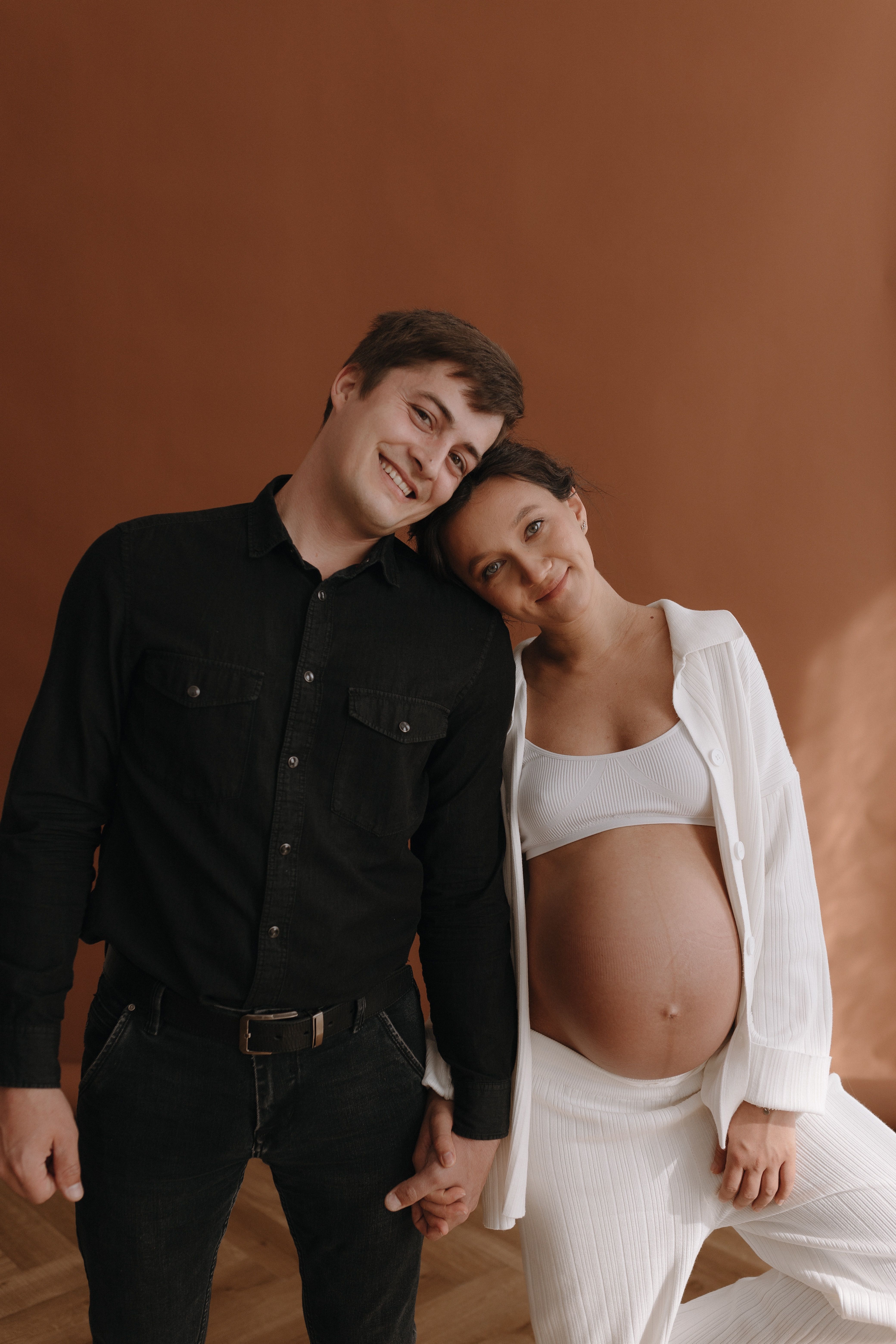 Smiling Man and Pregnant Woman · Free Stock Photo
