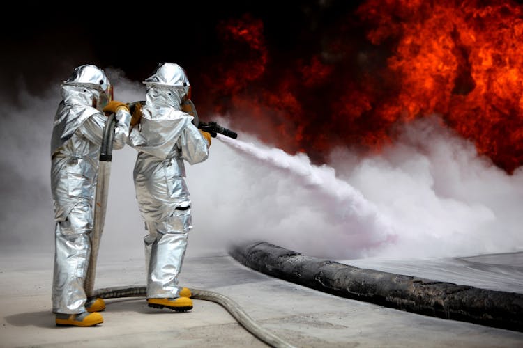 Firefighters Extinguishing Blazing Fires