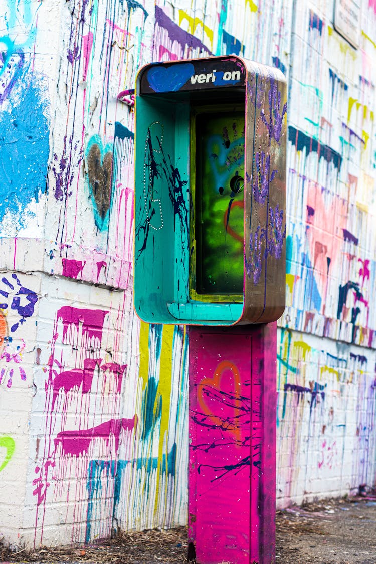 Brown And Pink Telephone Booth