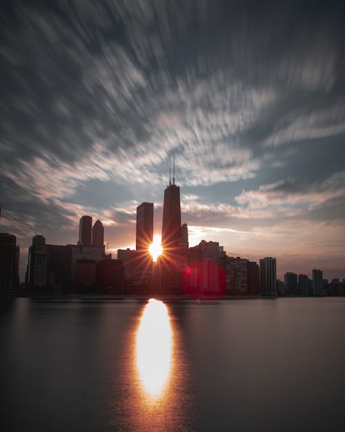 Scenic View Of City During Sunset