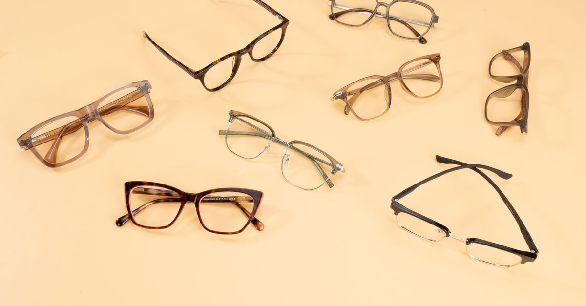 A stylish collection of eyeglasses showcased on a beige background, capturing modern fashion trends.