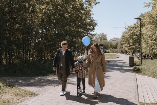 family walking in park Mississauga