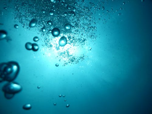 Free Water Drops on Blue Background Stock Photo