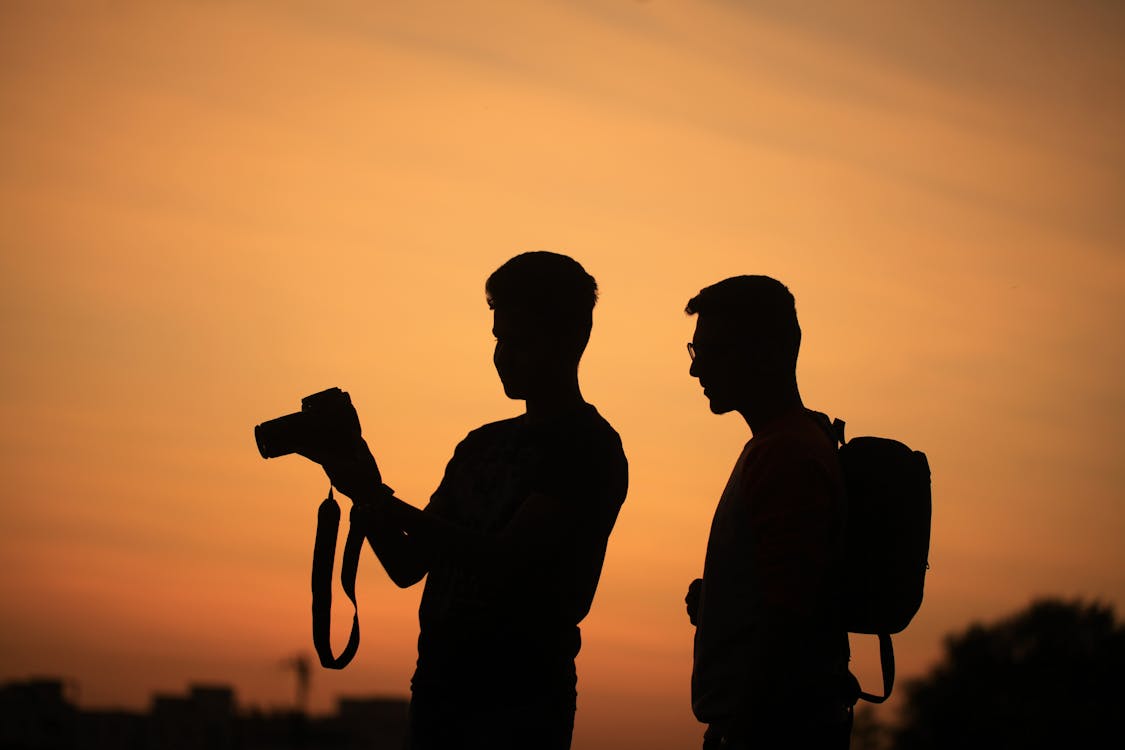 Free Silhouette of Two Men Stock Photo