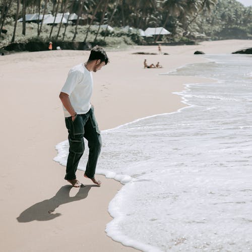Barefoot Man on Exotic Beach
