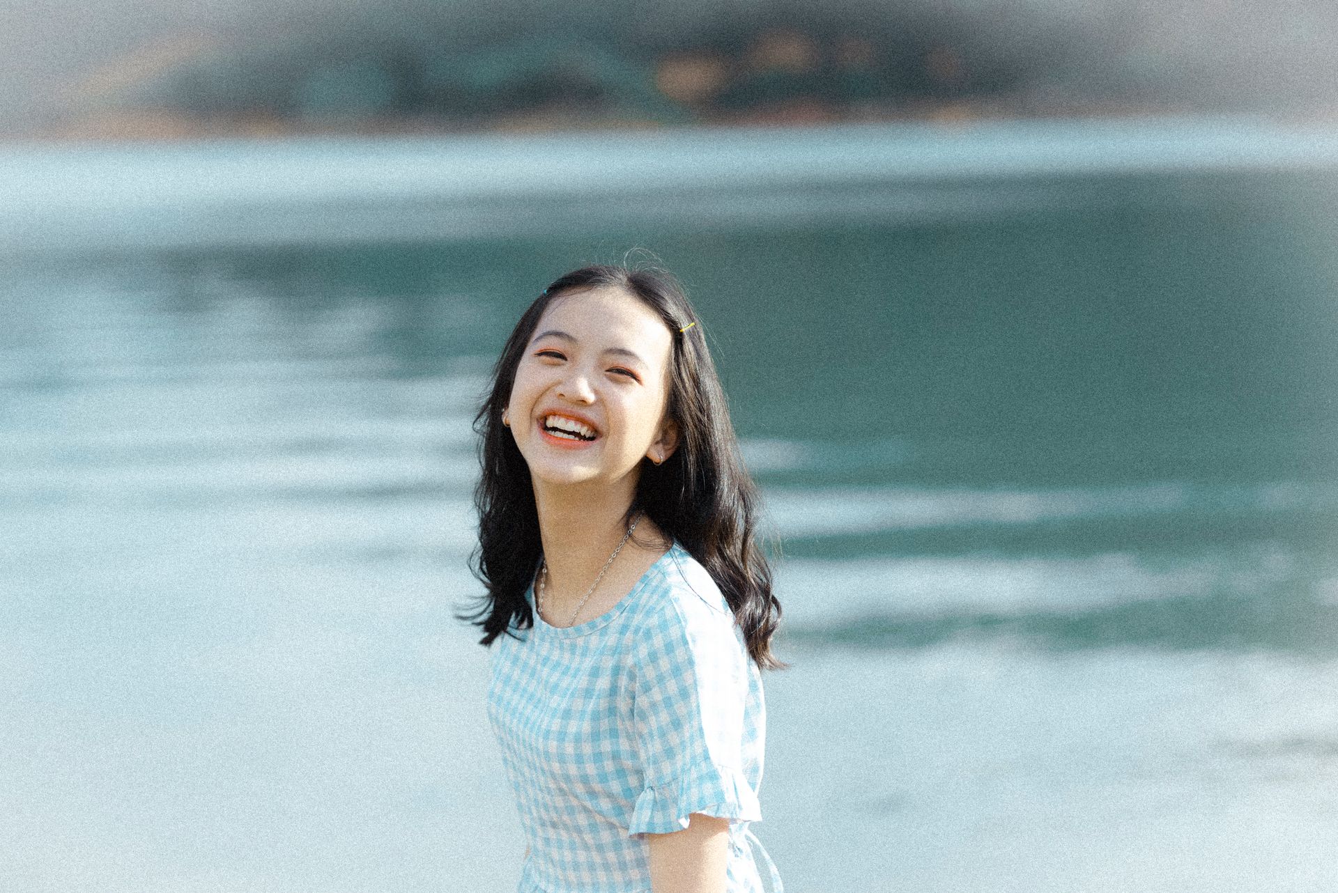 Shallow Focus Photo of Girl Smiling