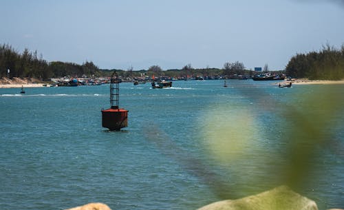 Foto profissional grátis de areia, azul, barcos