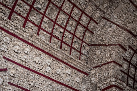 Interior view of the Chapel of Bones with skulls and bones as decoration in Faro, Portugal.
