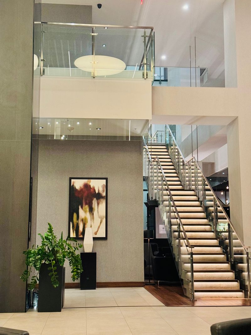 Elegant frameless glass staircase railing