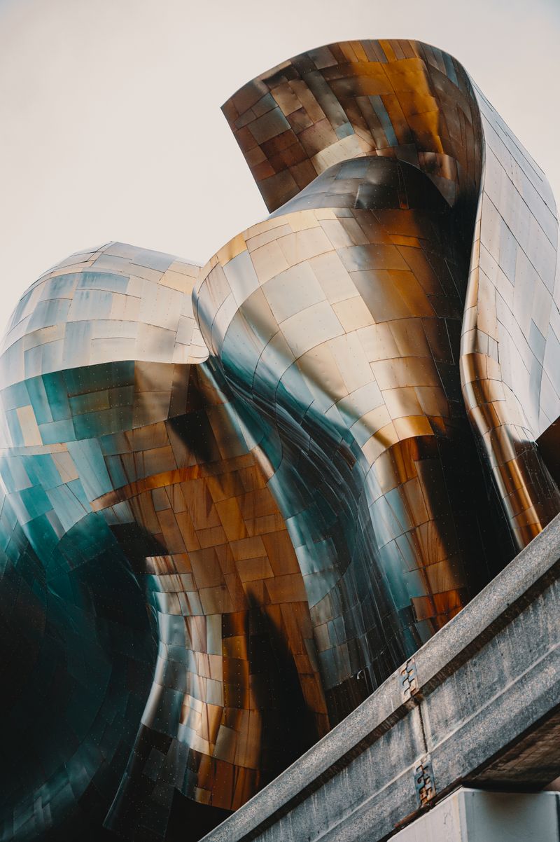 Curved metallic facade of the Museum of Pop Culture in Seattle