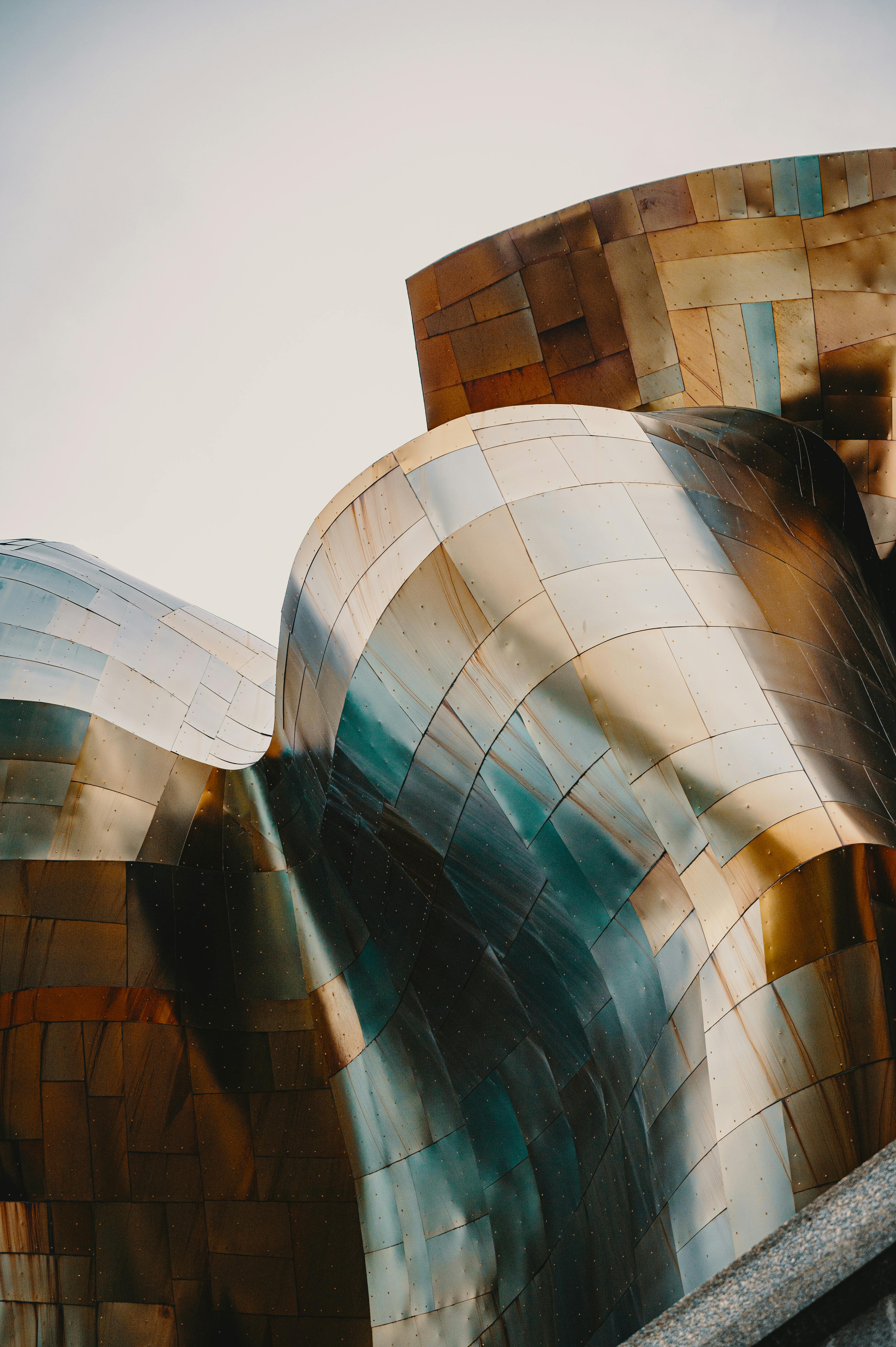 A close-up of futuristic architecture with metallic curves in Seattle, WA.