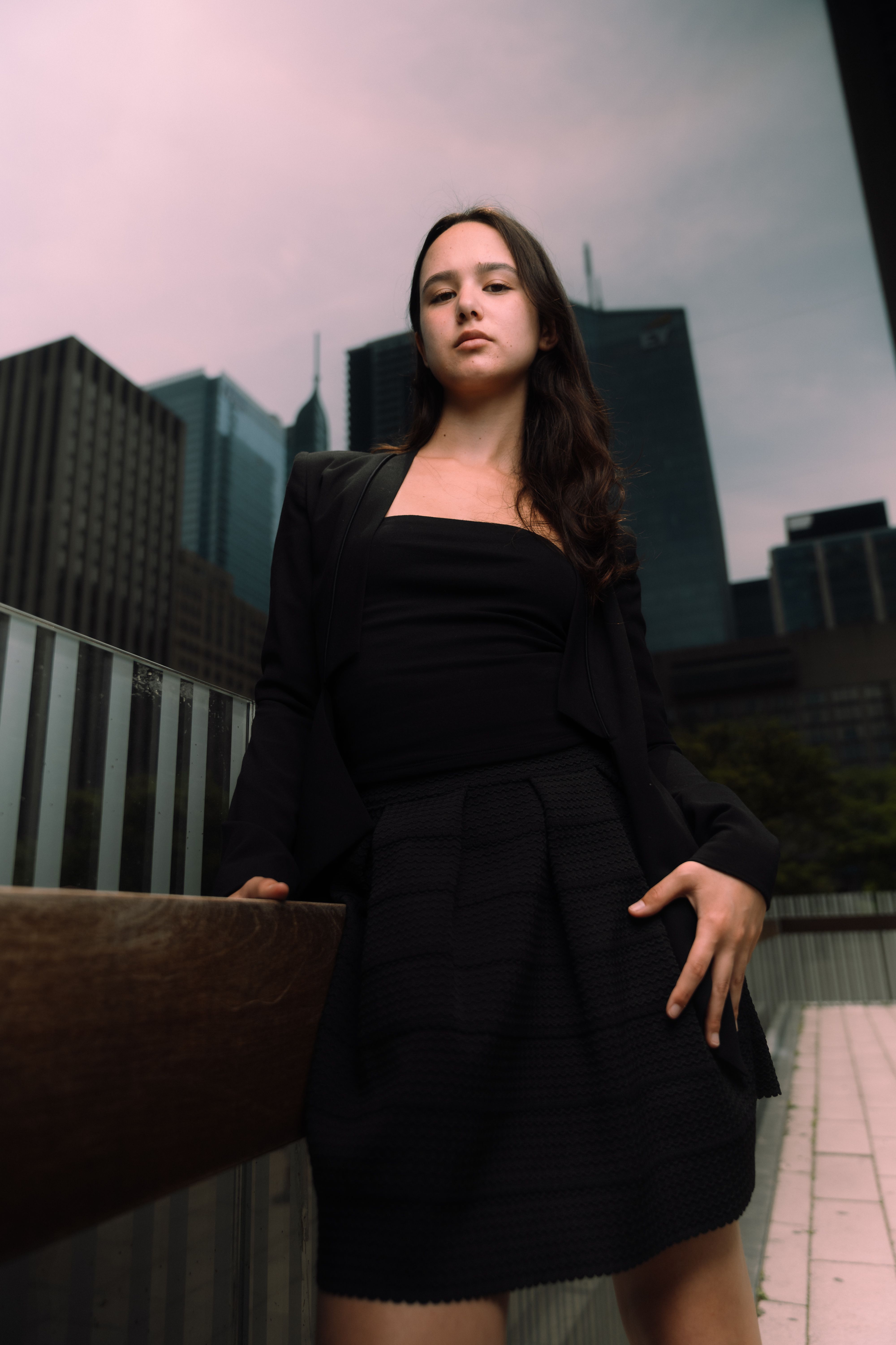 A woman in a black dress posing for a photo · Free Stock Photo