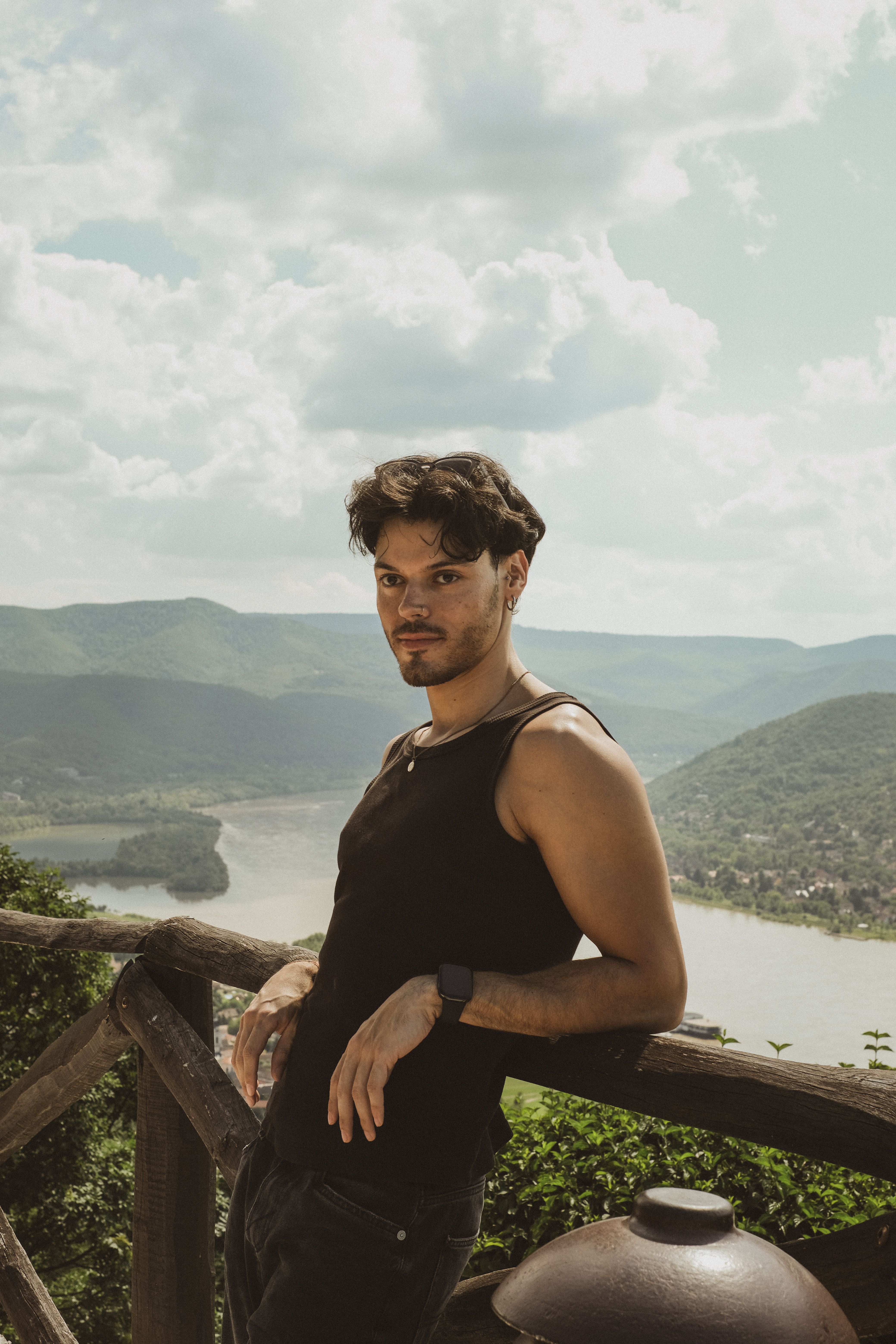 Standing Man Leaning on Railing against Valley · Free Stock Photo