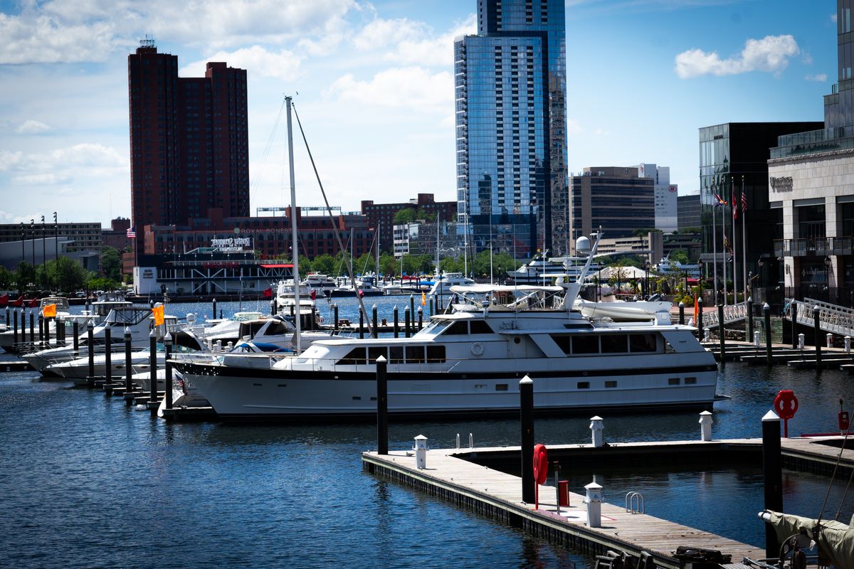 Marina with yachts and modern buildings along the shoreline