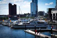 Fishing boats along a quay — photo by Corwin Melvin on Pexels