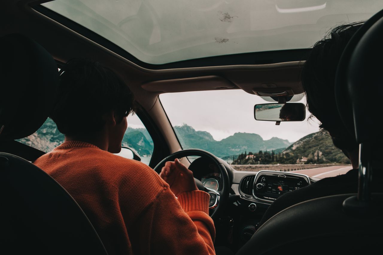 enjoy a scenic drive through mountains with friends front passenger vi