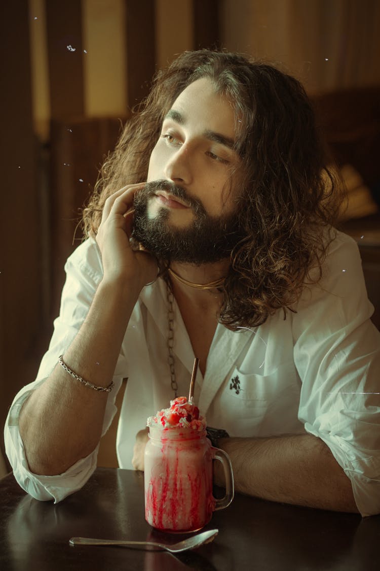 Photo Of A Man Wearing White Long Sleeves Shirt