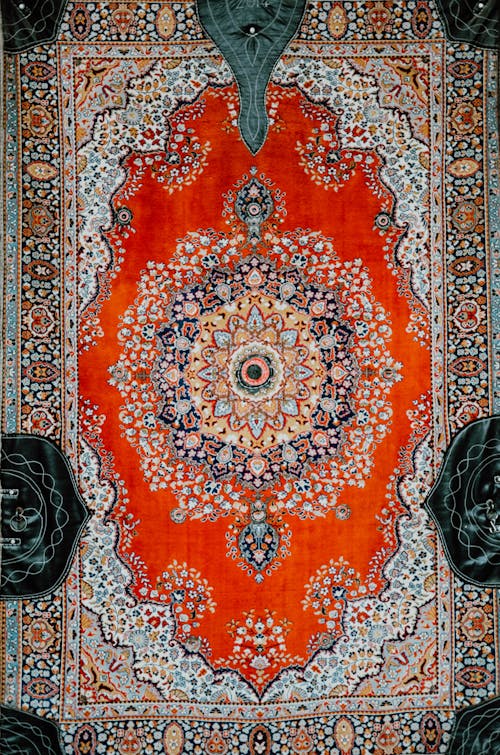 A persian rug with a floral design