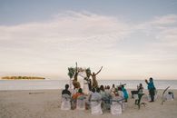 Experience a stunning beach wedding ceremony with scenic ocean views in Fiji.