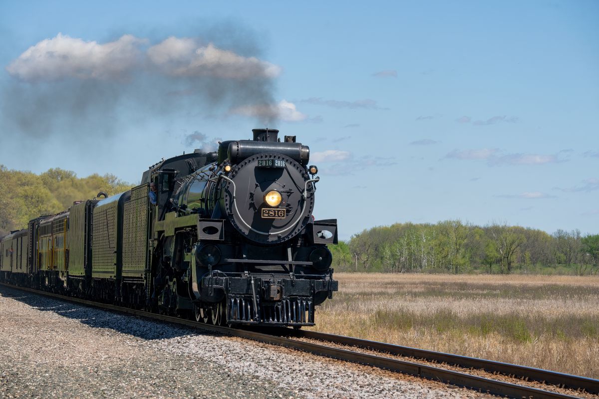 Steam Engine Rolling Vintage Steam Locomotive Rolling Along the Forest · Free Stock Photo