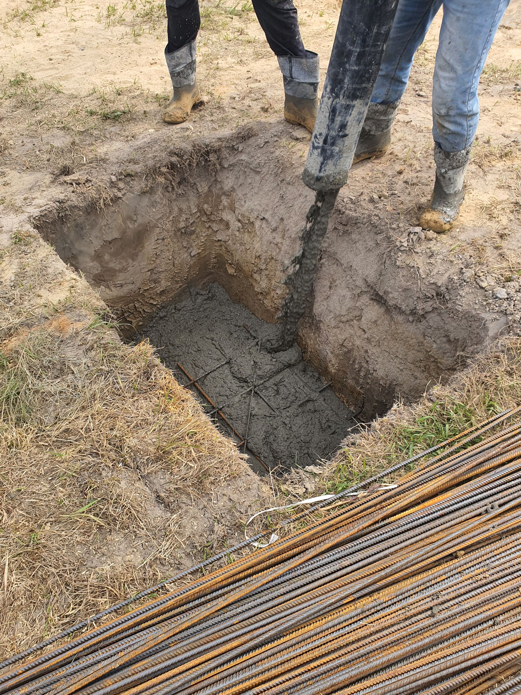 Structural concrete placed over treated subgrade