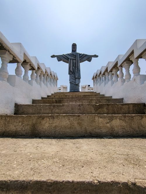Free A replica of Christ the Redeemer in Naic, Philippines, viewed from the stairs under a clear blue sky. Stock Photo