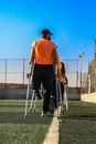 Man Holding Gray Walking Cane