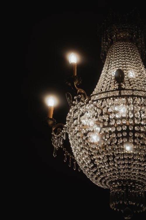 Free Luxurious crystal chandelier illuminating Leipzig's elegant interior setting. Stock Photo