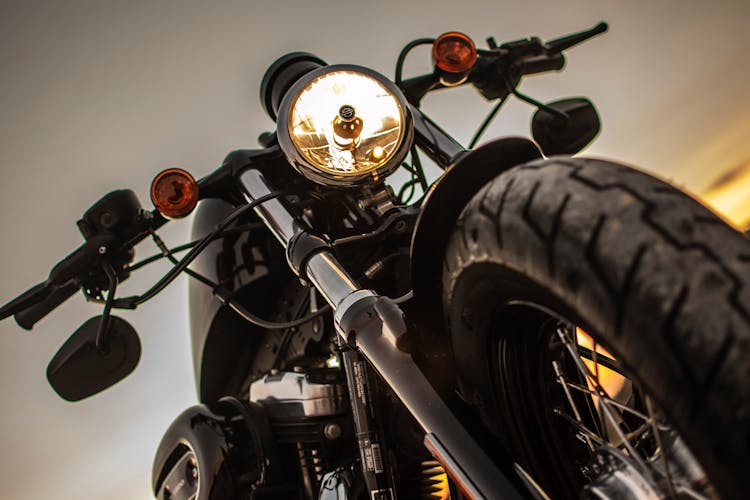 Low-angle Close-up Photo Of Parked Harley Davidson Motorcycle