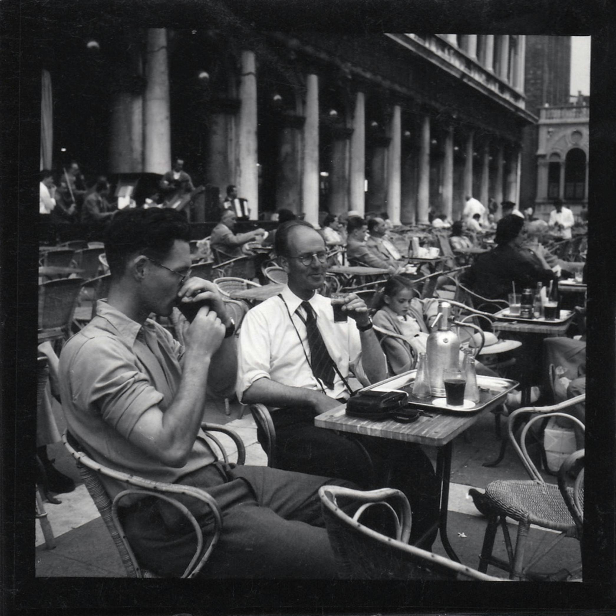 Old Photography of Two Men Drinking