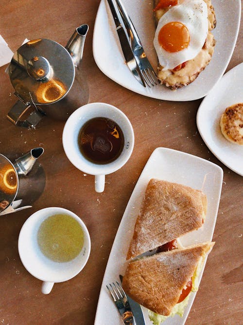 Flat Lay Photo of Breakfast Sandwich on Plate