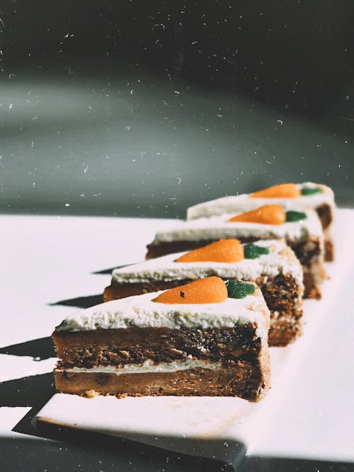 Photo of Four Sliced Carrot Cakes