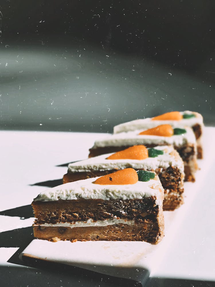 Photo Of Four Sliced Carrot Cakes