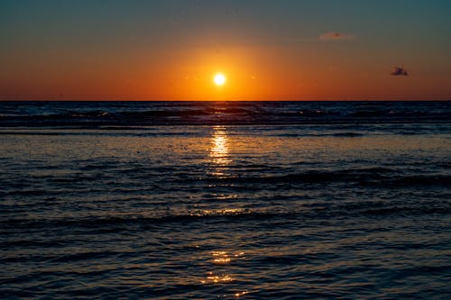 Photos gratuites de à la plage, coucher de soleil, mer