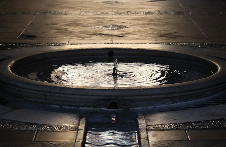 Water In Concrete Fountain