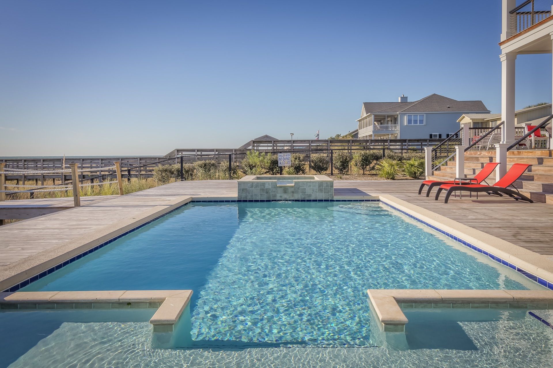 The house and pool at midday