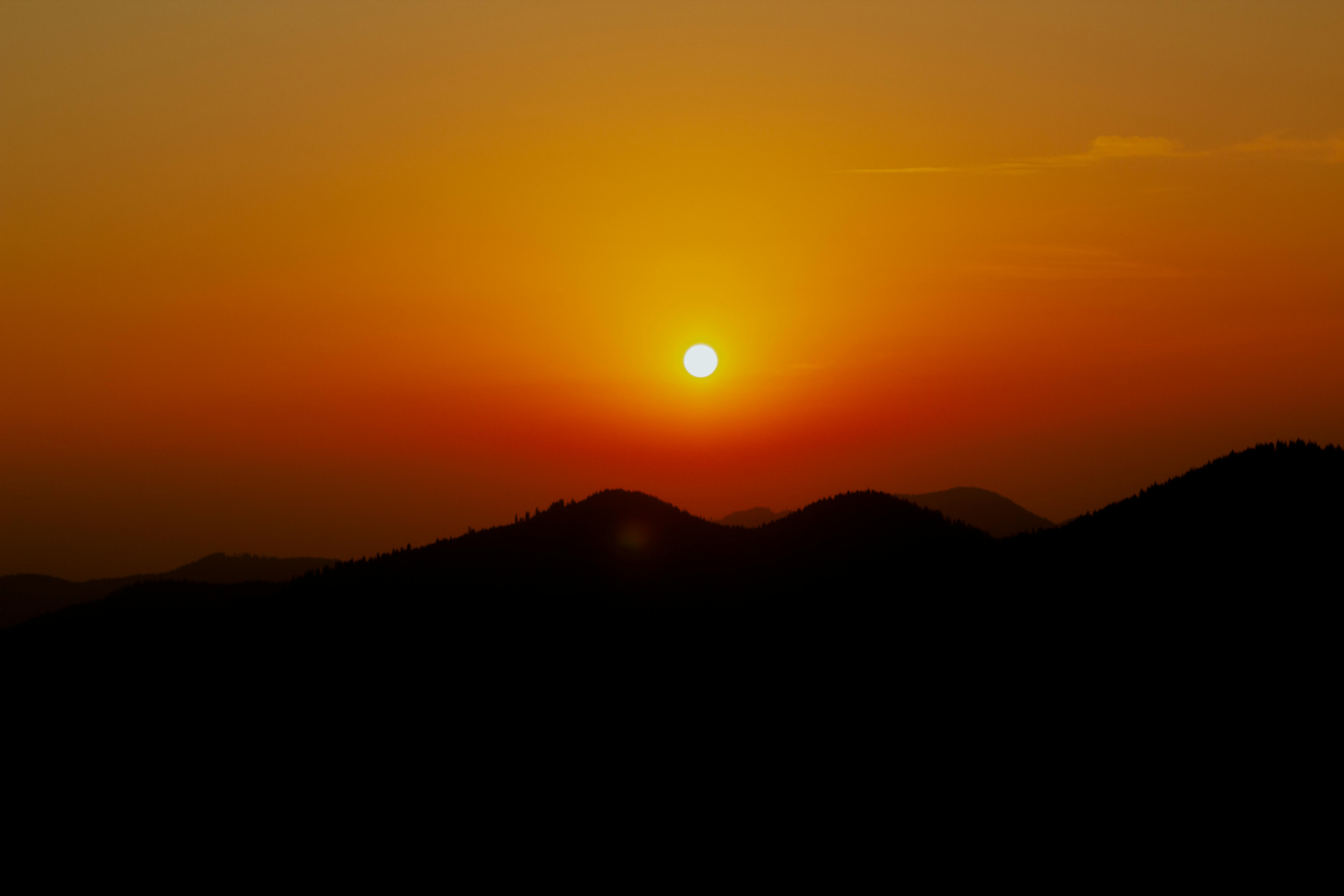 Stunning sunset view over the Carpathian Mountains in Zakarpattia, Ukraine.