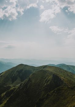 Stunning view of the Carpathian landscape in Ukraine under a bright sky.