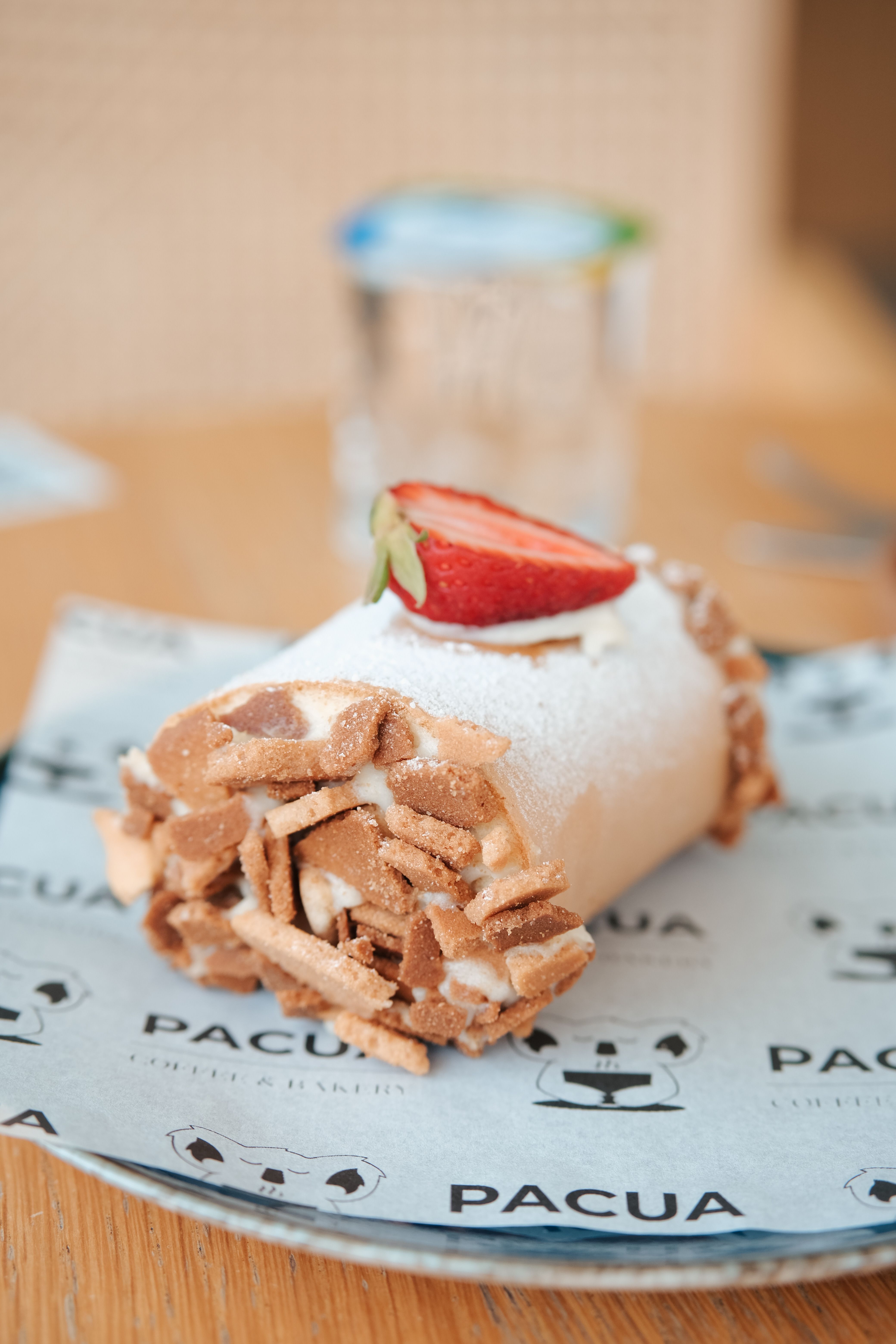 Tasty meringue dessert with a fresh strawberry slice, perfect for sweet tooth cravings.