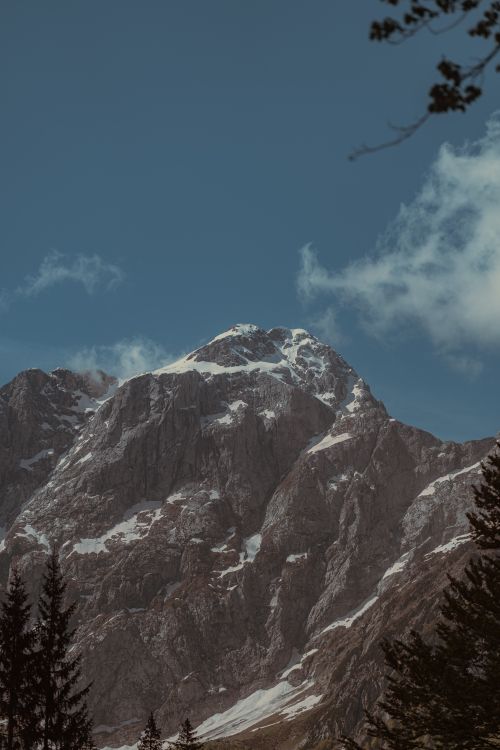 Free Discover the stunning snowcapped mountains of Tarvisio, a nature lover's paradise. Stock Photo