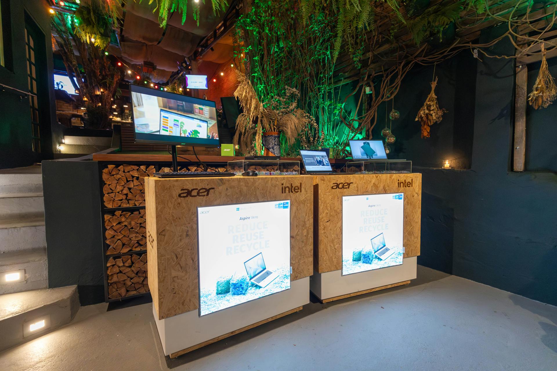 Acer and Intel showcase sustainable technology in a nature-themed setting.