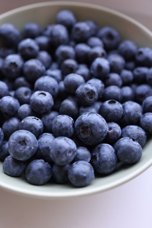 Free Close-up of juicy blueberries in a bowl, perfect for healthy meals. Stock Photo