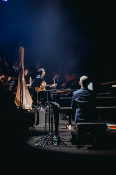 Elegant classical music concert with orchestra performing in Hà Nội, Vietnam.